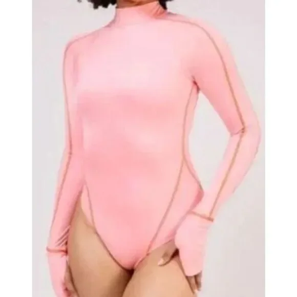 New. Hot as hell for Free People pink rash guard. Large. Retails $240